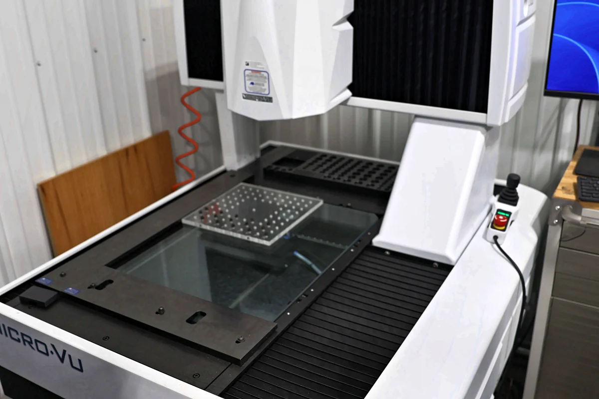 Close view of the Micro-Vu inspection stage and optical measurement head